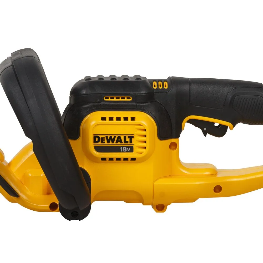 Pildil on DeWalt akuhekipügaja DCM563PB, millel on kollane korpus, mustad käepidemed ja mille peal on DeWalt logo.