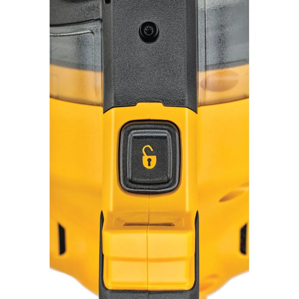 Pildil on näha DeWalt akutolmuimeja DCV501LN detail, millel on selgelt eristuv must "lukustatud" ikooniga nupp kollasel...