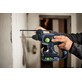 Pildil on näha Festool akupuurvasar KHC-S 18, mida inimene kasutab puurimiseks seina.