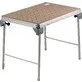 Pildil on Festool multifunktsionaalne laud MFT/3 Basic, millel on perforeeritud lauaplaat ja metallist jalad.