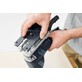 Pildil on näha Festool akutikksaag PSC 500 EB-Basic Set, millel inimene hoiab kinni ja paigaldab selle tööriista...