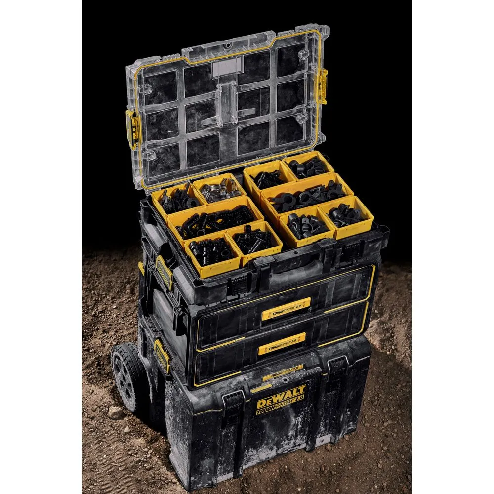 Pildil on näha DeWalt ToughSystem™ 2.0 DS100 tarvikute kohver, mis on täis erinevaid musti osi, paigutatud kollastesse...