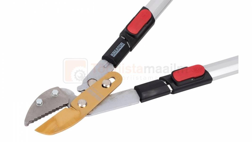 Pildil on Kreator pikendatavad oksakäärid, millel on punased detailid ja mis on osaliselt lahti.